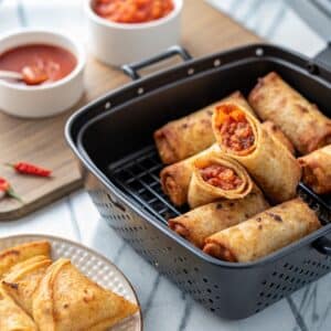 crispy pizza rolls in air fryer basket