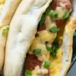 Golden brown air fryer brats cooked to perfection at 375°F.