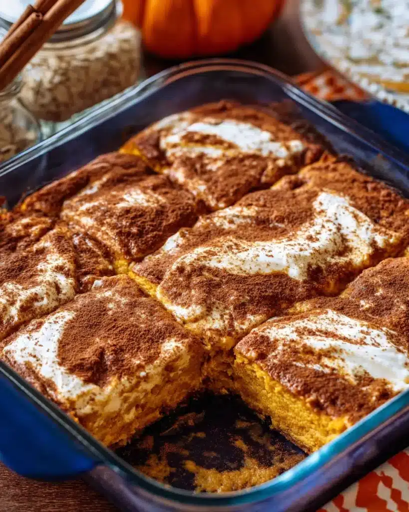 Healthy Pumpkin Cottage Cheese Bake topped with spices in a baking dish