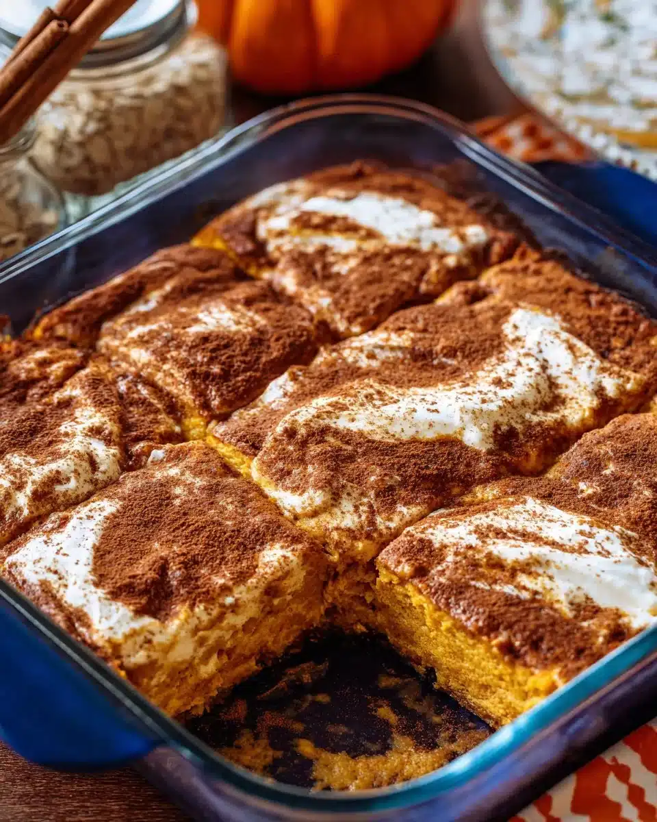 Healthy Pumpkin Cottage Cheese Bake topped with spices in a baking dish