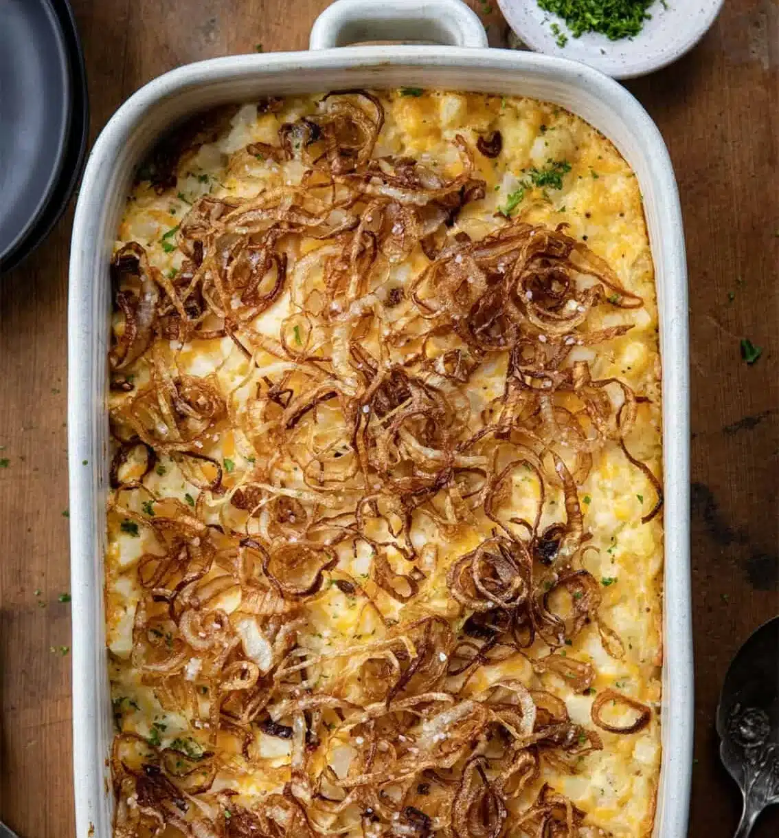 French Onion Funeral Potatoes topped with crispy onions and cheese.